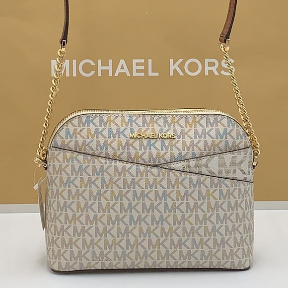 Michael Kors Medium Dome Xcross Xbody Bag
Color: Vanilla Multi - Picture 15 of 16